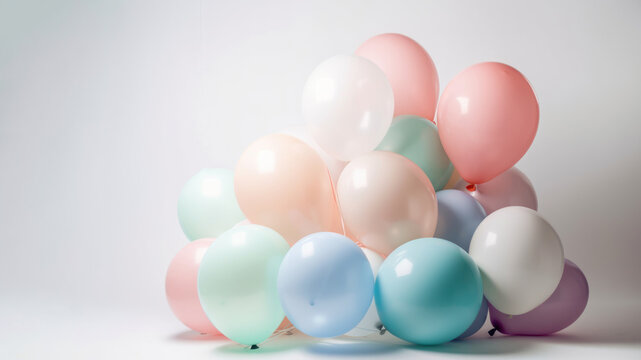 Pastel colorful balloons in white room background. Party and celebration. Generative ai. © ant