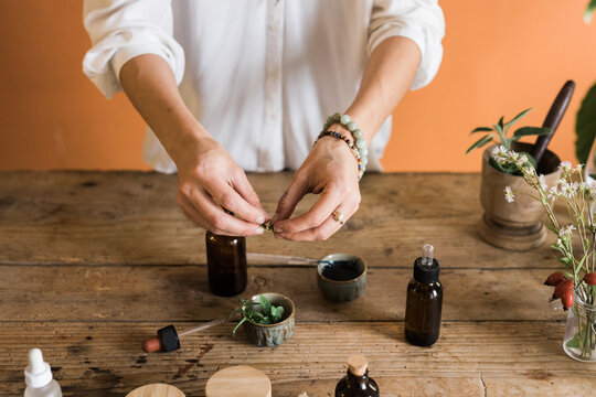 Naturopath Preparing Essential Oils