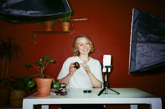 Film frame ugc, beauty blogger showing cream