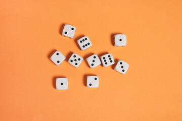 Dices on a orange background