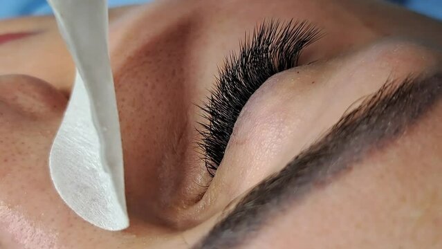 Close up of eye with eyelash extensions ,beauty salon treatment ,2d volume, 3d volume, classical lashes,Russian volume,megavolume, new set