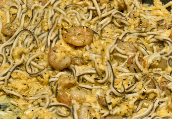 A dish of gulas with shrimp, a delicious combination of seafood that will transport you to the sea...
