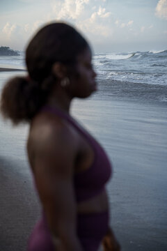 Blurry image of a woman at the beach