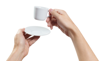 Hands holding a small cup of coffee or tea, cut out