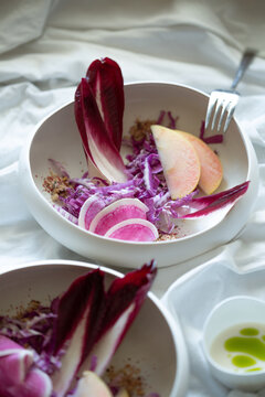 Purple Belgian endive salad with watermelon radish