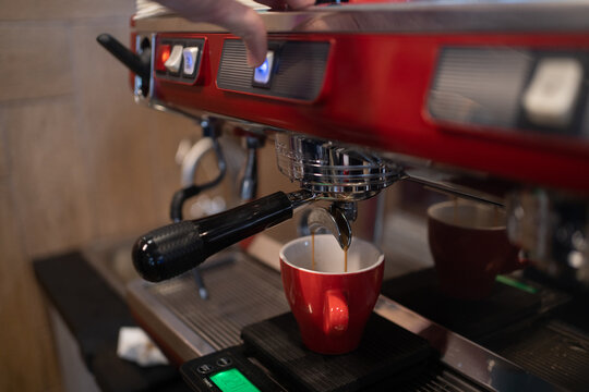 Espresso being prepared in a coffee machine