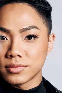 Macro Portrait of LGBT Model featuring long lashes and timeless makeup