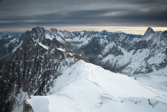 Panoramic of the Mont Blanc Massif at sunrise. Chamonix. Franc