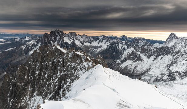 Panoramic of the Mont Blanc Massif at sunrise. Chamonix. Franc