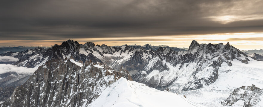Panoramic of the Mont Blanc Massif at sunrise. Chamonix. Franc
