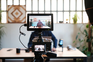 Camera filming man in live streaming 