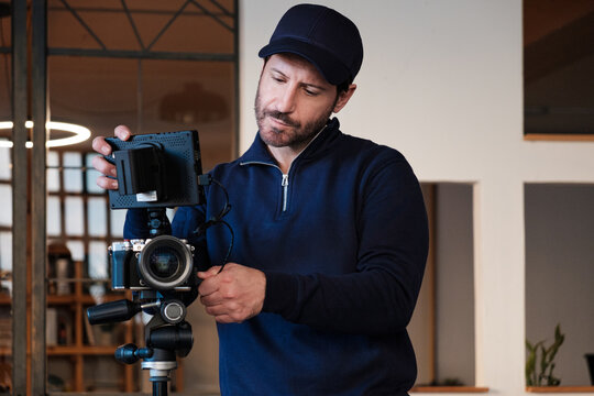 Cameraman preparing equipment For recording