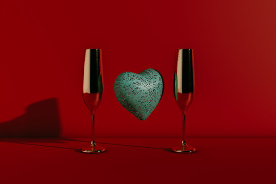 Heart in the middle of two gold cups