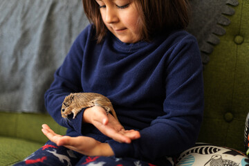 little girl and gerbil