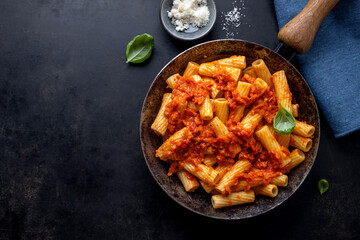 Pasta with tomato sauce served on pan