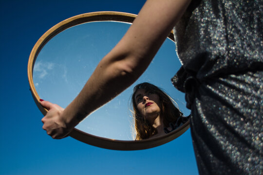 Woman reflection on the mirror