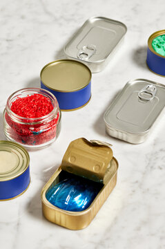 Plastic trash in tin cans and glass jar