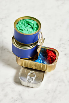 Plastic trash in tin cans and glass jar