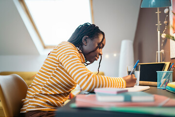 Teenager girl during homeschooling