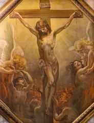  GENOVA, ITALY - MARCH 5, 2023: The painting of Crucifiction and souls of purgatory in the church Chiesa di Santa Maria Maddalena by Mattia Traverso (20. cent.). © Renáta Sedmáková