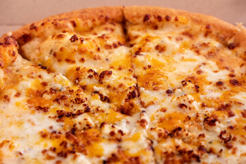 Quatro formaggi four cheese pizza detail, fast food
