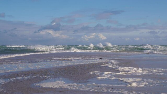 2022 - Waves crash on the sandbar spit Grenen in Skagen, Denmark.