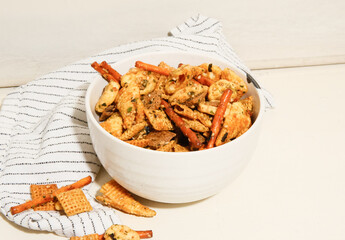 Chex mix snack in bowl on counter top 