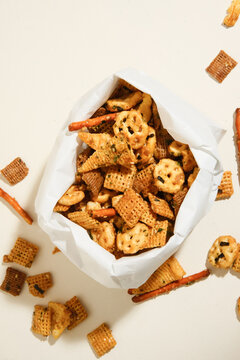 Asian chex mix snack food in paper bag