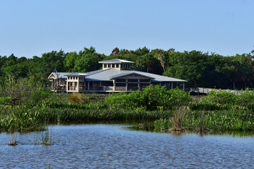 Fototapeta na wymiar Green Cay Nature Center and Wetlands visitor pavilion in Boynton Beach, Florida on clear cloudless sunny morning..