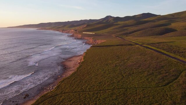 2023 - Excellent aerial footage of an Amtrak train approaching a bend near Jalama Beach, California.