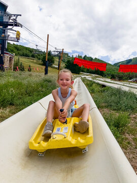 Child portrait Riding Mountain Slide on vacation