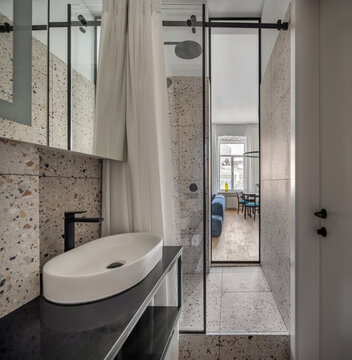 Beige marble bathroom interior. Luxury flat