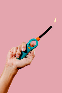 man lighting a gas lighter