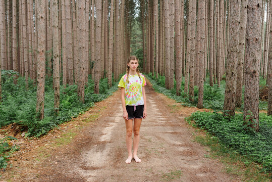 Teen girl in a forest