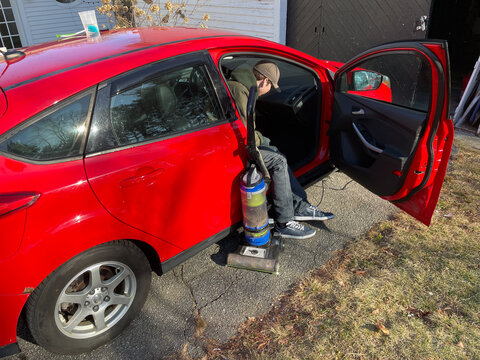 UGCteenager cleaning his car