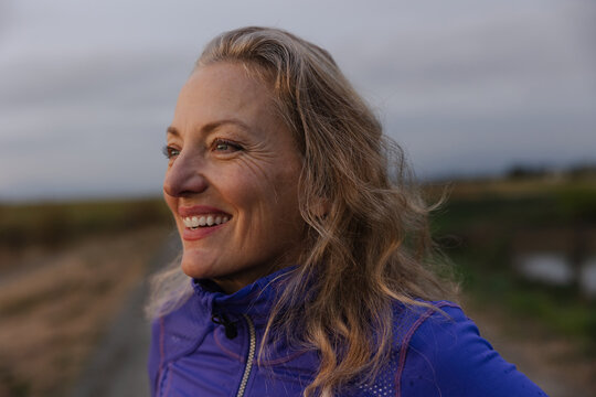 Fit Woman Breathing Hard After Run Exercise Outside.