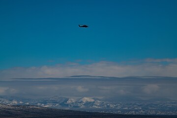 Blackhawk helicopter over the New Mexico Mountains