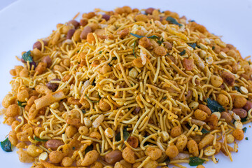 Deep fried Indian mixture snack having transfat and is unhealthy for health leading to Cholesterol