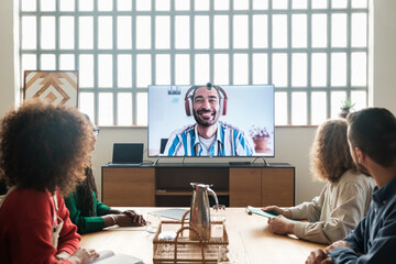 Work team in video call from office