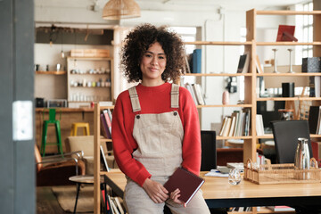 Young office worker looking at camera 