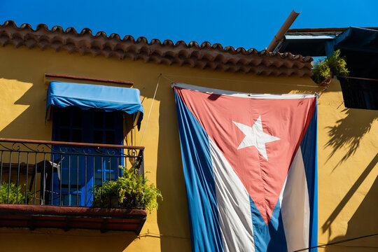 Cuban Flag Hanging Outside A House