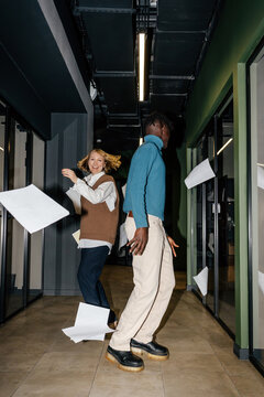 Diverse colleagues celebrating project completion