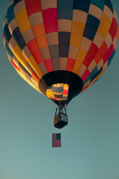Hot Air Balloon Among Bright Blue Sky