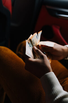 Man Counting Money Bills 