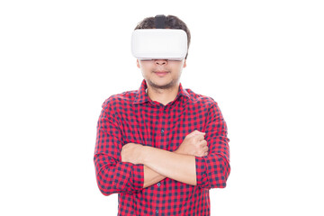 Man stands with arms crossed and using virtual reality headset.