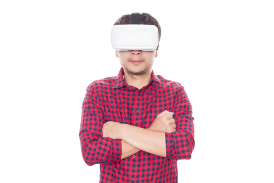 Man stands with arms crossed and using virtual reality headset.