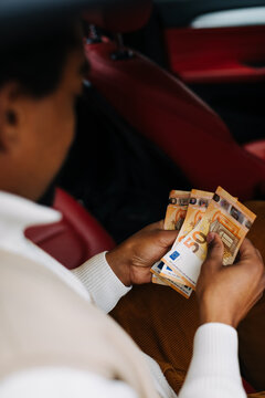 Man Counting Money Bills 