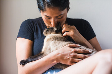 Woman loving her pet