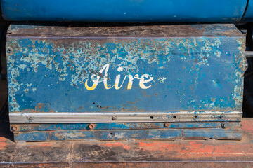 Detail Of An Air Tank Of A Truck. Written: Air, Aire.