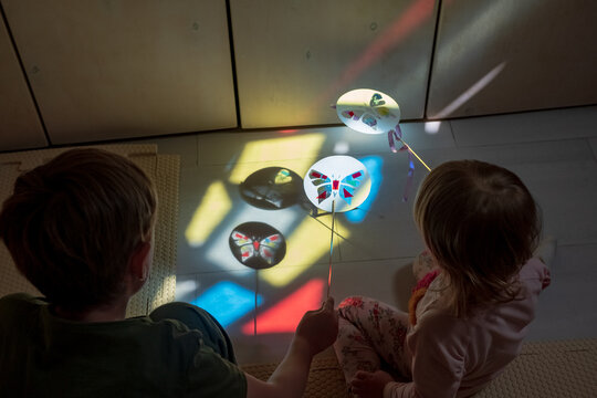 light therapy : boy plays with light